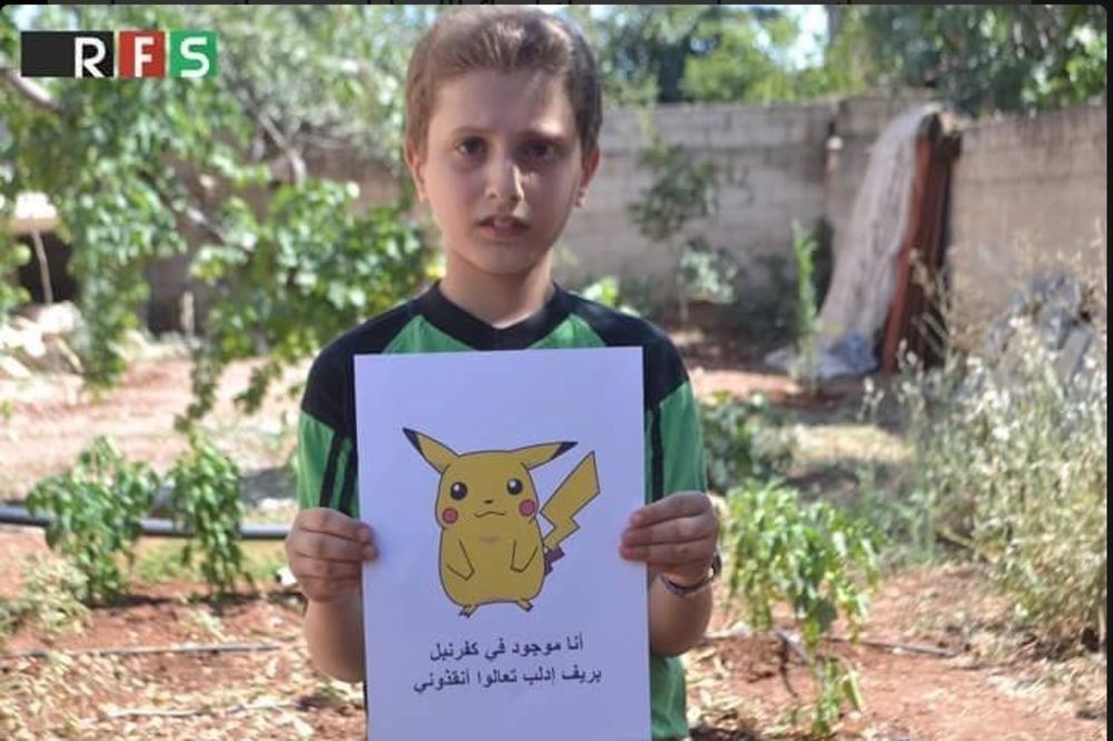 POTRESNA PORUKA SIRIJSKIH DEČAKA: Evo zašto deca iz Alepa drže slike Pokemona
