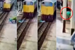 (UZNEMIRUJUĆI VIDEO 18+) ČUDO GA SPASLO: Bacio se pod voz, i on ga zaobišao!