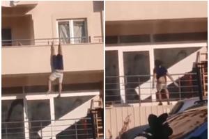 BEŽI IZ ŠVALERACIJE: Mladić snimljen kako visi sa terase stana u Budvi! Ljudi misle da je spasavao živu glavu od ljubomornog muža! (VIDEO)