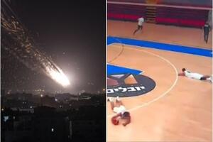 HAOS NA UTAKMICI U IZRAELU: Košarkaši ležali na parketu posle ispaljenog PROJEKTILA! VIDEO