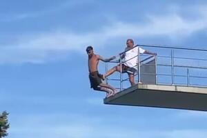 ZASTRAŠUJUĆI TRENUTAK UHVAĆEN NA KAMERI! Gurnuo je klinca sa 10 metara visine, ovako se pravdao! (VIDEO)