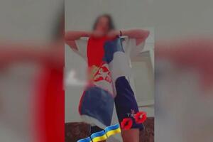 POJAVIO SE SNIMAK: Pogledajte kako maloletnica u Baru cepa i pljuje zastavu Srbije (VIDEO)