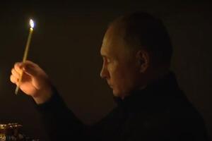 PUTIN UPALIO SVEĆU ZA POKOJ DUŠA UBIJENIH U MOSKVI: Predsednik Rusije vidno potresen došao u crkvu OČI MU PUNE SUZA (VIDEO)