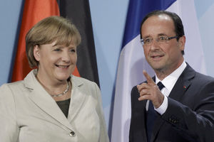 Merkel i Oland za ostanak Grčke u evrozoni