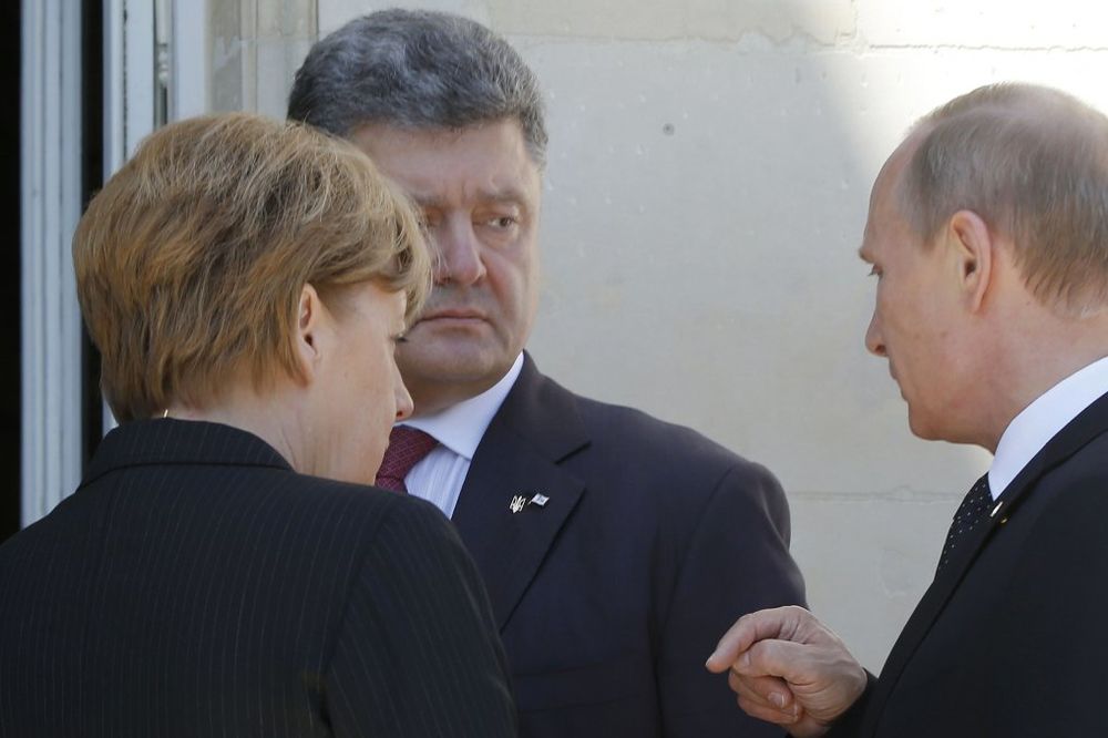 MOGUĆ SASTANAK: Vladimir Putin i Petar Porošenko zajedno na samitu u Minsku