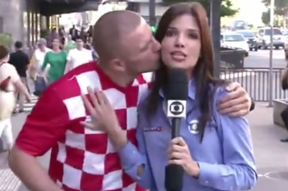 ISKORISTIO PRILIKU: Hrvatski navijač poljubio lepu Brazilku dok je izveštavala