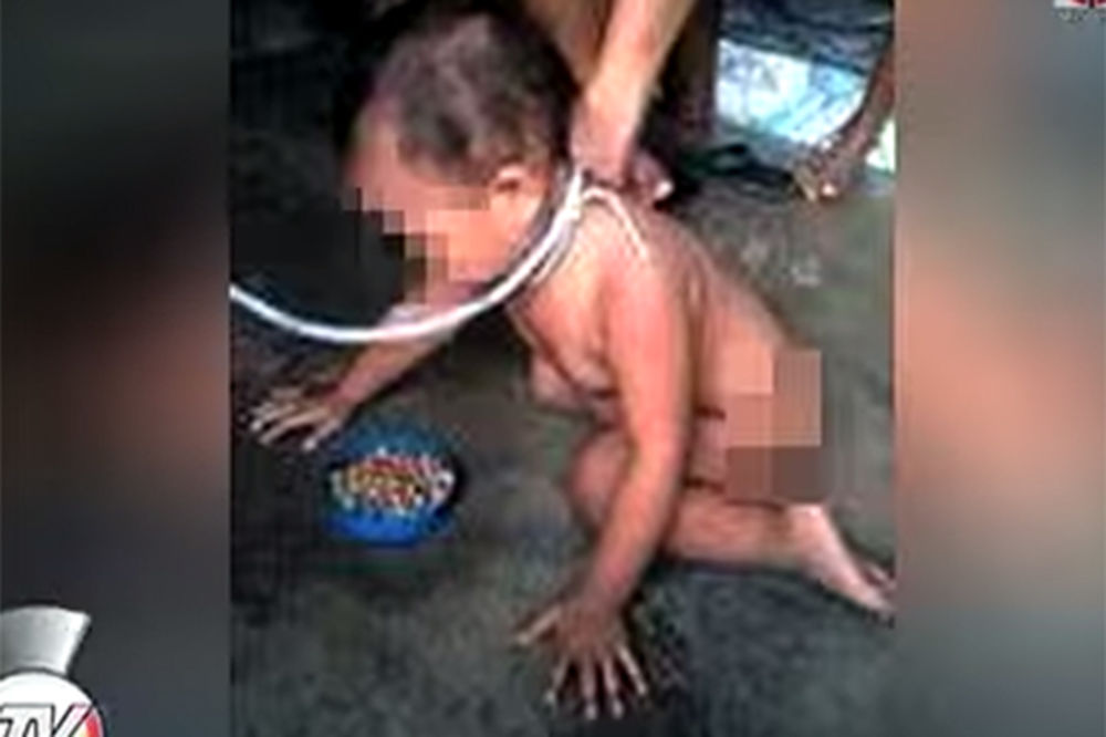 (VIDEO) UŽASNO I ODVRATNO: Rođenu bebu vezuje kao psa i hrani na podu!