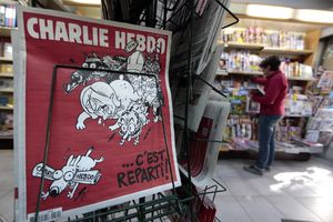 ŠARLI EBDO PONOVO ŠOKIRA: Francuski list karikaturom ismejao smrt malog Ajlana