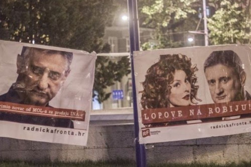 HRVATSKU POTRESA AFERA KARAMARKO: Plakatima "Lopove na robiju" oblepili sedište HDZ!