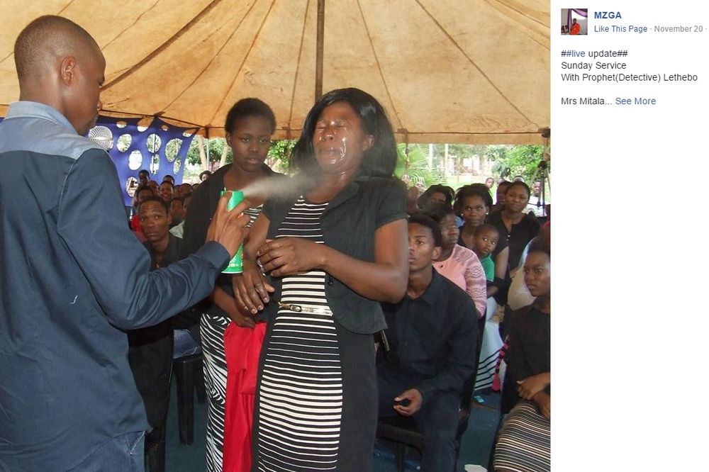 (FOTO) LEČI RAK I HIV INSEKTICIDOM: Sveštenik vernicima prska otrovni sprej direktno u oči
