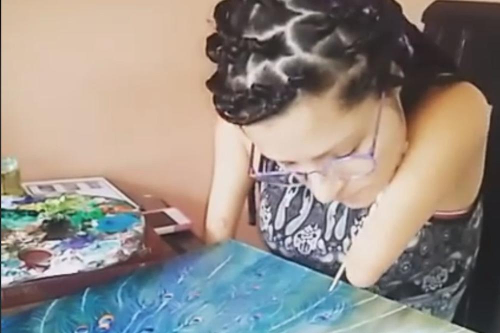 (VIDEO) LJUBAV PREMA UMETNOSTI NE POZNAJE GRANICE: Devojka (29) koja je rođena bez ruku ima neverovatan talenat i inspiriše sve!