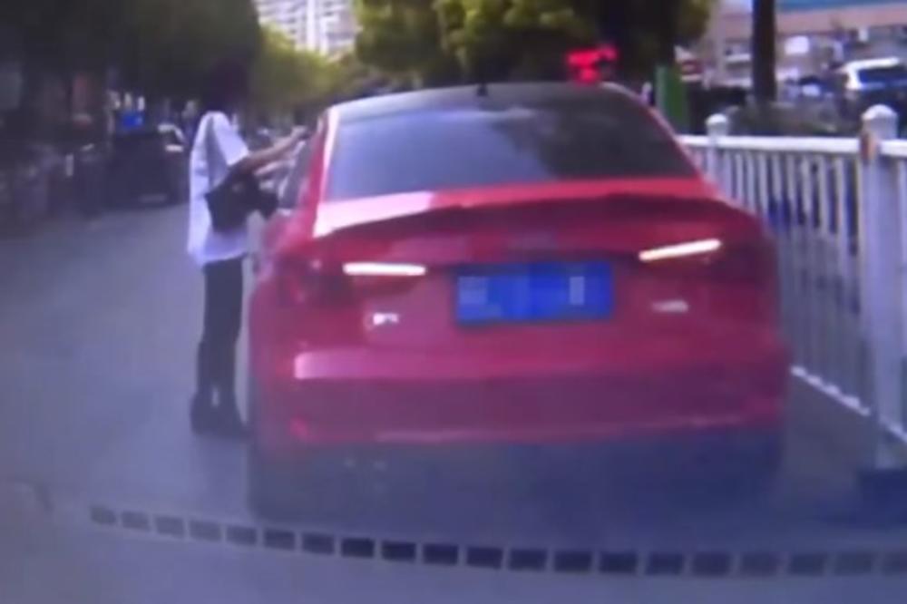 (VIDEO) KINESKA POSLA: Ova žena se dosetila kako da izbegne plaćanje kazni za parkiranje, ali su je onda kamere raskrinkale