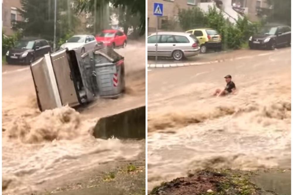 BUJICA NOSILA ČOVEKA I KONTEJNERE! Neverovatan potop na Banovom Brdu, voda jurila niz ulice i napravila HAOS! (VIDEO)
