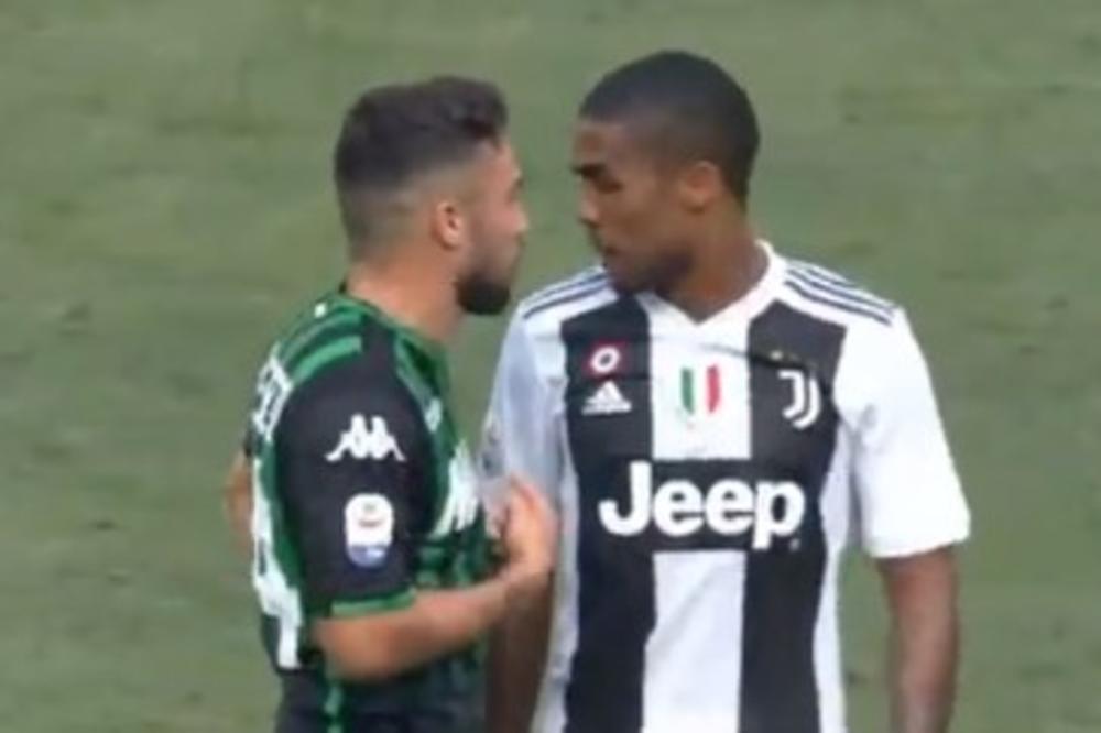 OVO JE VIDEO OD SINIŠE MIHAJLOVIĆA: Fudbaler Juventusa pljunuo rivala u usta! Pogledajte prostački potez Daglasa Koste (VIDEO)