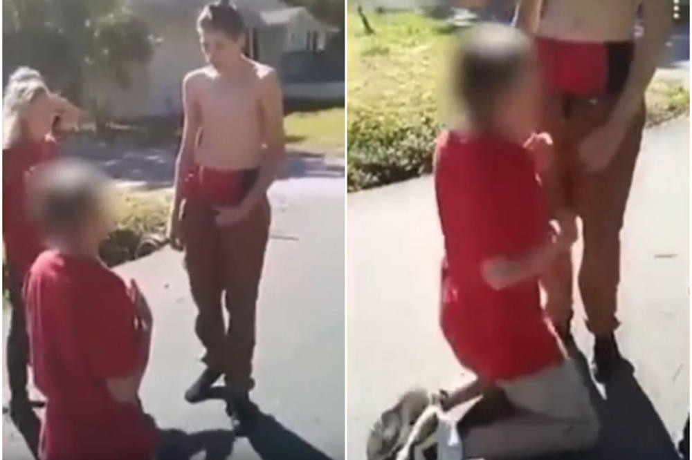 UZNEMIRUJUĆI SNIMAK PRESTRAVIO AMERIKU: Tinejdžer maltretirao dečaka, terao ga da mu ljubi stopala, a onda je izvukao oružje (VIDEO)
