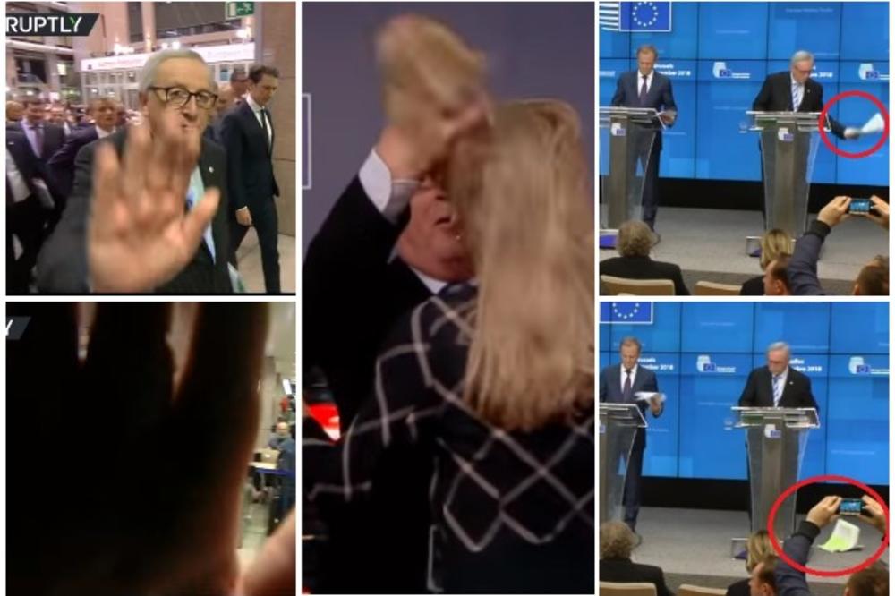 TOTALNO OTKAČIO! Junker u Briselu bacao papire po podu, tresao ženi kosu, blokirao kameru rukom... Opet kriv išijas? (VIDEO)