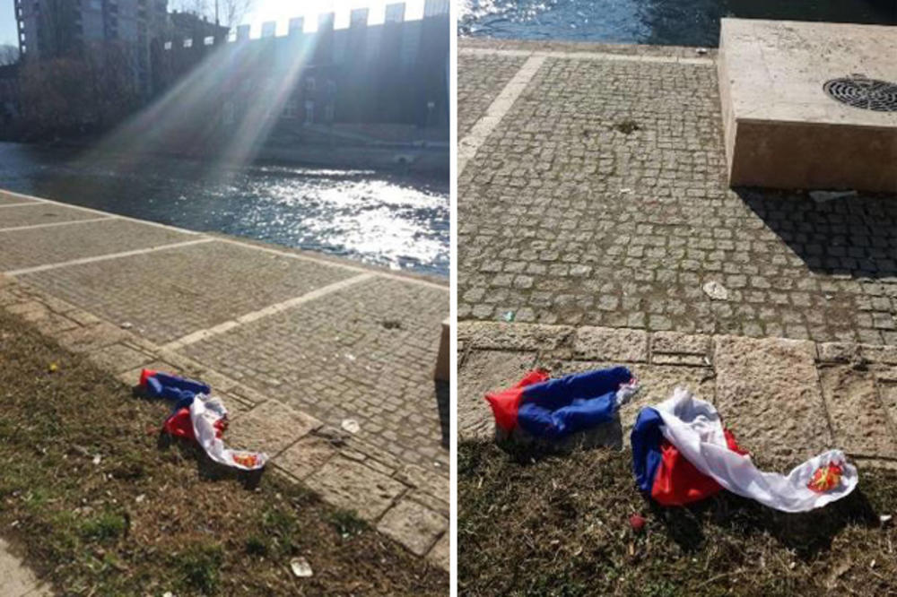 SKANDAL U SEVERNOM DELU KOSOVSKE MITROVICE: Pocepana srpska zastava bačena na keju! Hteli i da je zapale (FOTO)