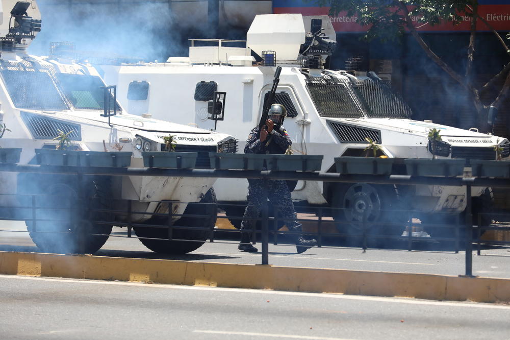 ŽESTOK OBRAČUN POLICIJE I BANDE U VENECUELI 26 mrtvih u sukobima u Karakasu