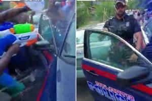 RULJA KRENULA NA POLICIJU PUŠKAMA NA VODU! Sve lije sa policajca, a on ne zna kako da utekne! (VIDEO)