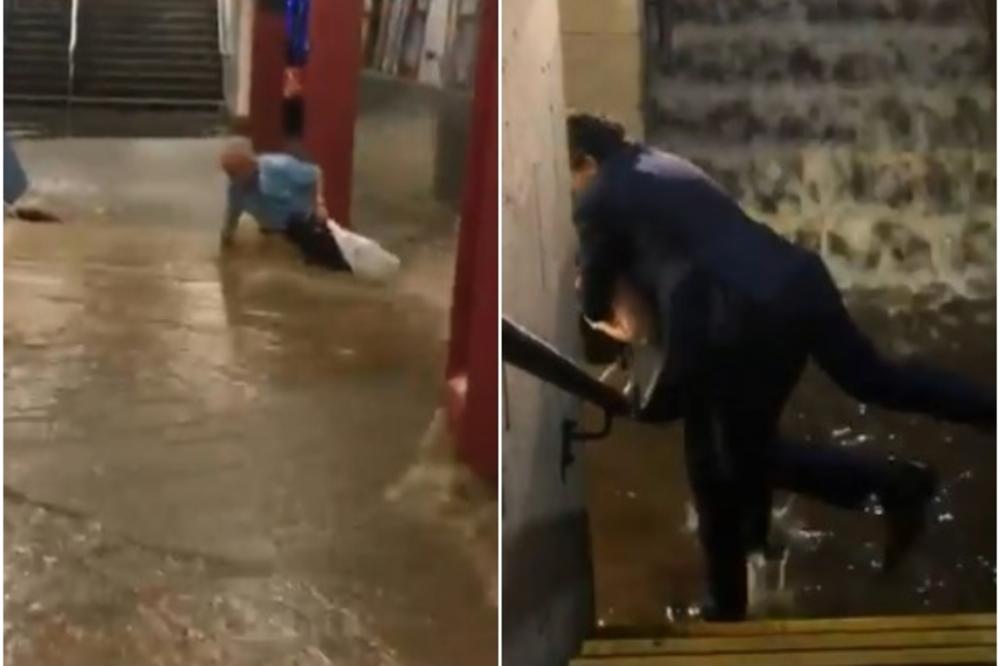 OVAKO NEŠTO NISTE DOSAD VIDELI: Dok je bujica nosila čoveka u njujorškom metrou, ovaj putnik u skupocenom odelu se izborio sa poplavama na šokantan način! (VIDEO)