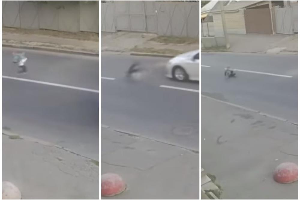 MALIŠAN JE PRETRČAVAO ULICU: Udar kola je dečaka odbacio nekoliko metara u vazduh, ali je ono što je uradio kada je pao ostavilo sve bez reči (VIDEO)