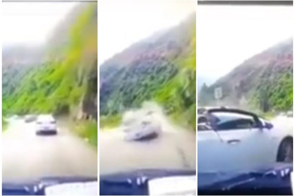 GROMADA SMRSKALA AUTO U KINI: Čovek je mirno vozio planinskim putem, sve se desilo u sekundi! (VIDEO)