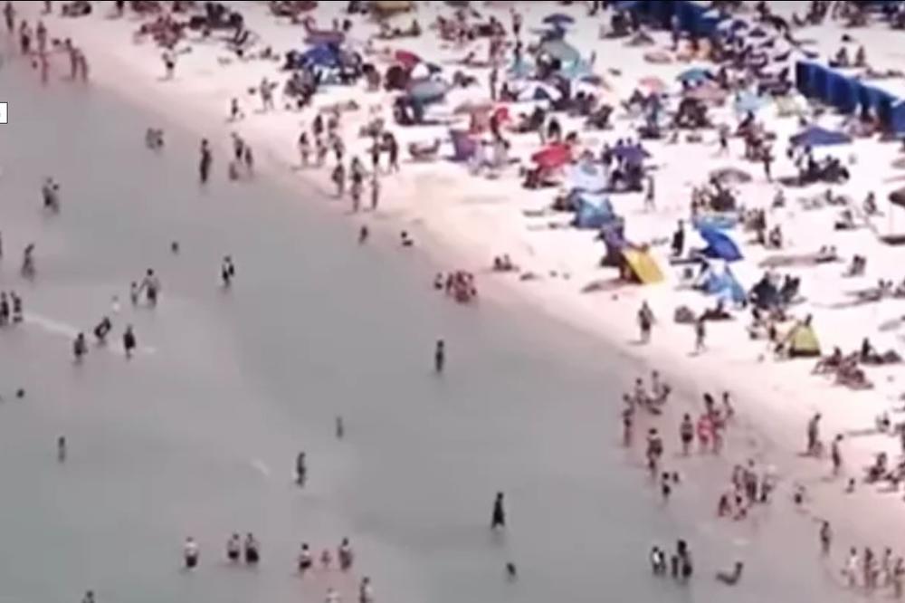 SUNCE, PLAŽA I KORONA: Scene sa plaže u Floridi zapanjile svet! (VIDEO)