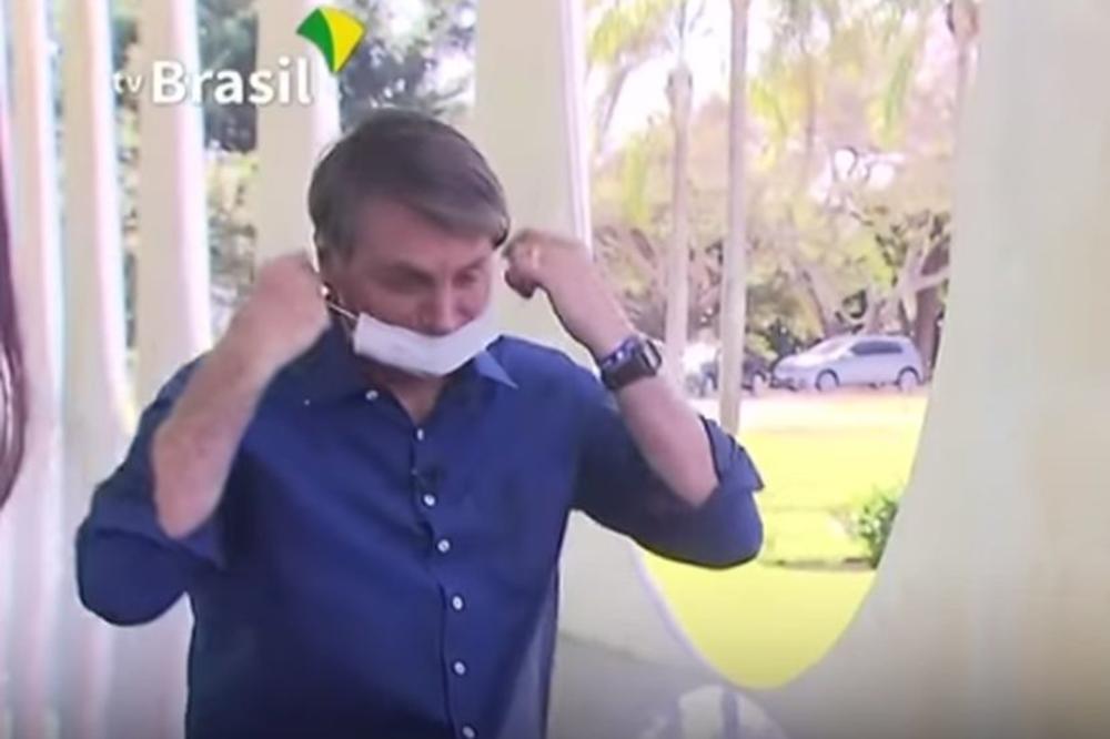 SAMO DA VIDITE MOJE LICE: Bolsonaro saopštio da je pozitivan na koronu, a onda je pred novinarima skinuo masku (VIDEO)
