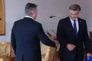 PREMIJER HRVATSKE OPREZAN ZBOG KORONE: Milanović pružio Plenkoviću ruku, a on ga pozdravio laktom (VIDEO)
