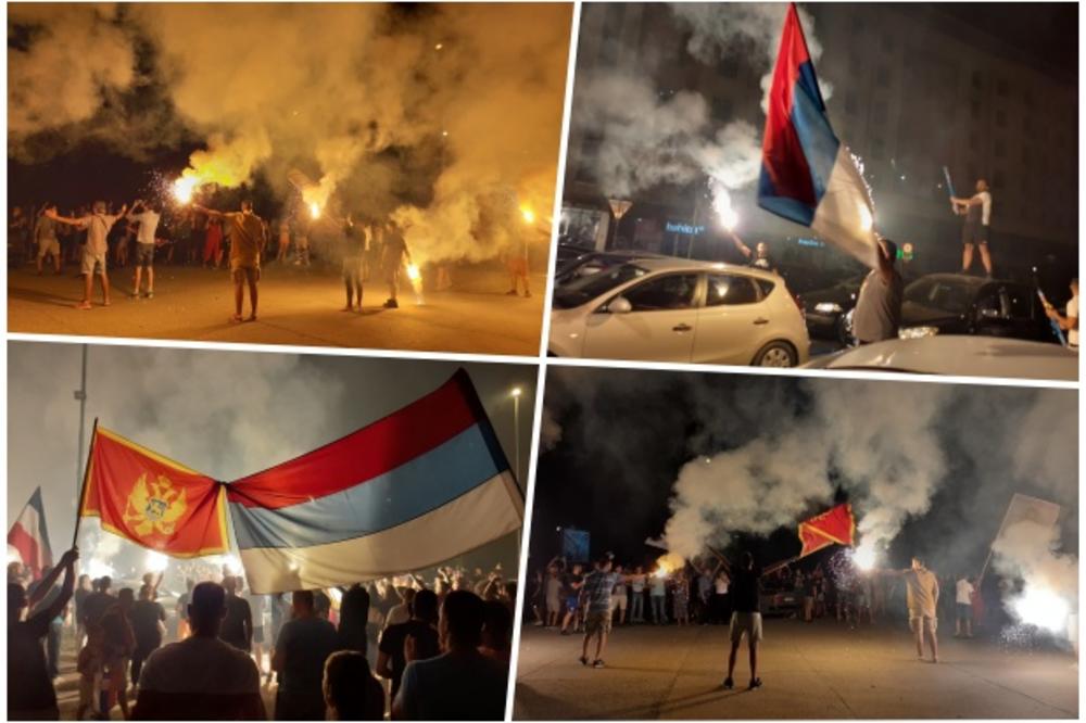 KURIR U CG: PODGORICA SE SMIRILA TEK PRED ZORU! Srpska i crnogorska zastava uvezane kao jedna! Pevalo se i slavilo!