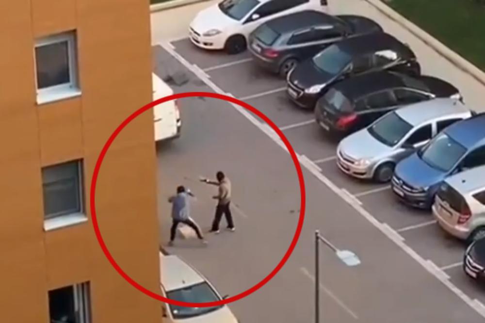 (UZNEMIRUJUĆE) POJAVIO SE SNIMAK PUCNJAVE U NOVOM BEOGRADU: Maskirani napadači prišli žrtvi na parkingu, zapucali, a onda pobegli