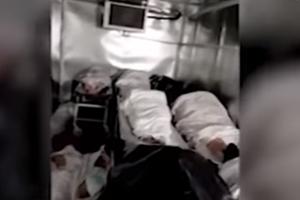 CNN OBJAVIO DRAMATIČNE SNIMKE IZ RUSIJE: Mrtvačnice su toliko pune da su tela umrlih naslagana jedno na drugo na podu (VIDEO)