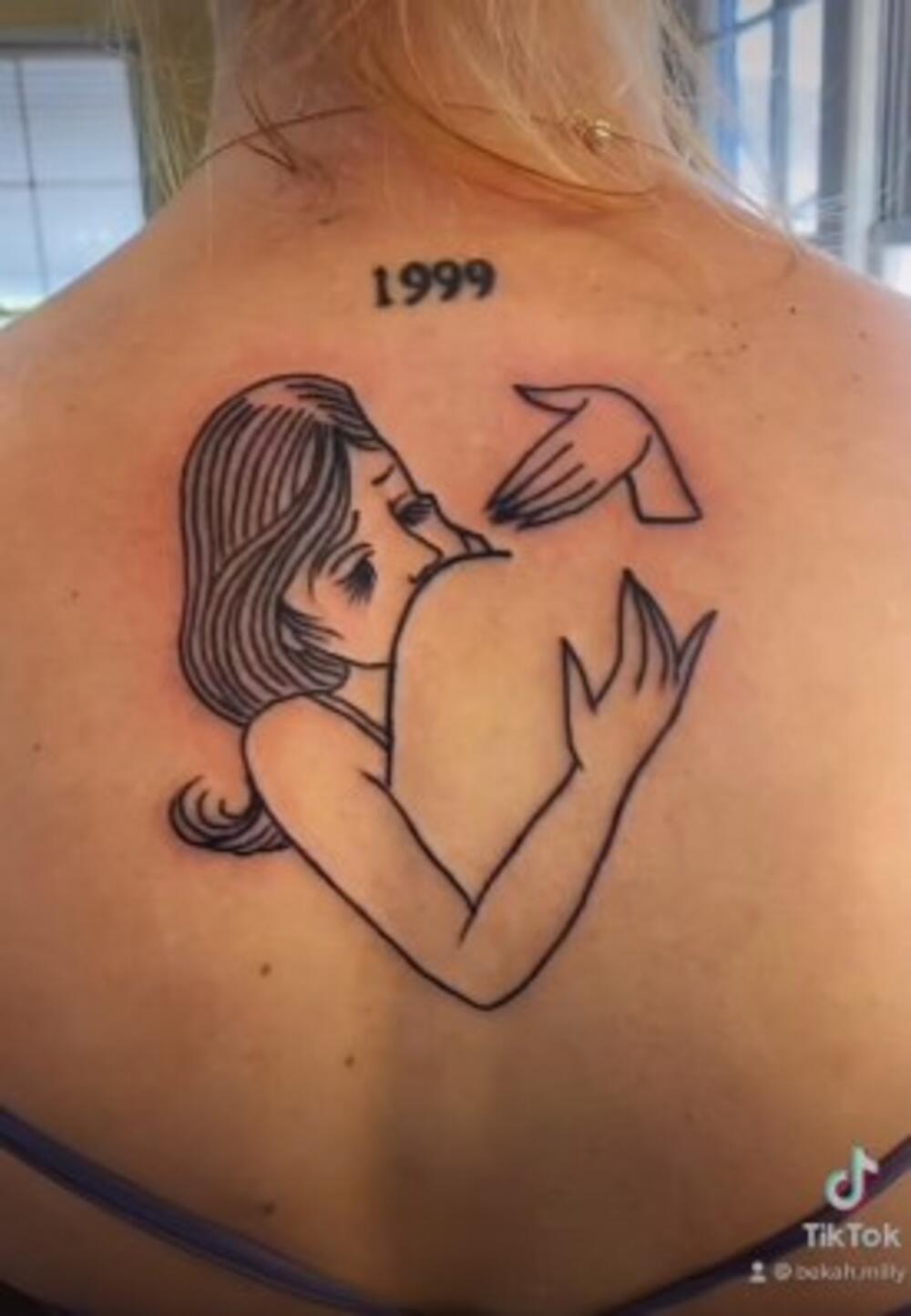 Beka Mili, tetovaža