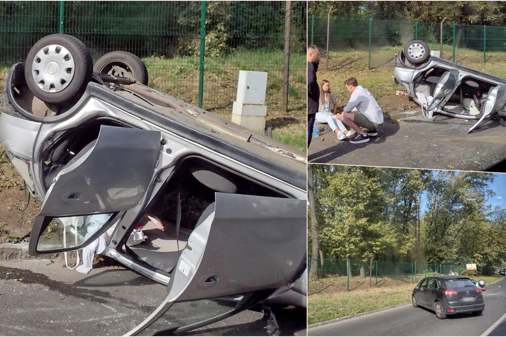 DŽUMBUS NA KOŠUTNJAKU: Auto se prevrnuo na krov! Pored puta sedela uplakana devojka, a kraj nje se momak držao za glavu (FOTO)