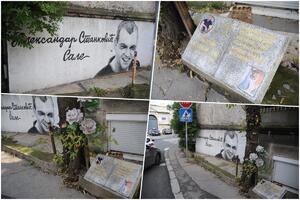 OVO SE NALAZI NA MESTU GDE JE LIKVIDIRAN VOĐA PARTIZANOVIH NAVIJAČA Grafit Saleta Mutavog, cveće i spomen-ploča u Bačvanskoj ulici