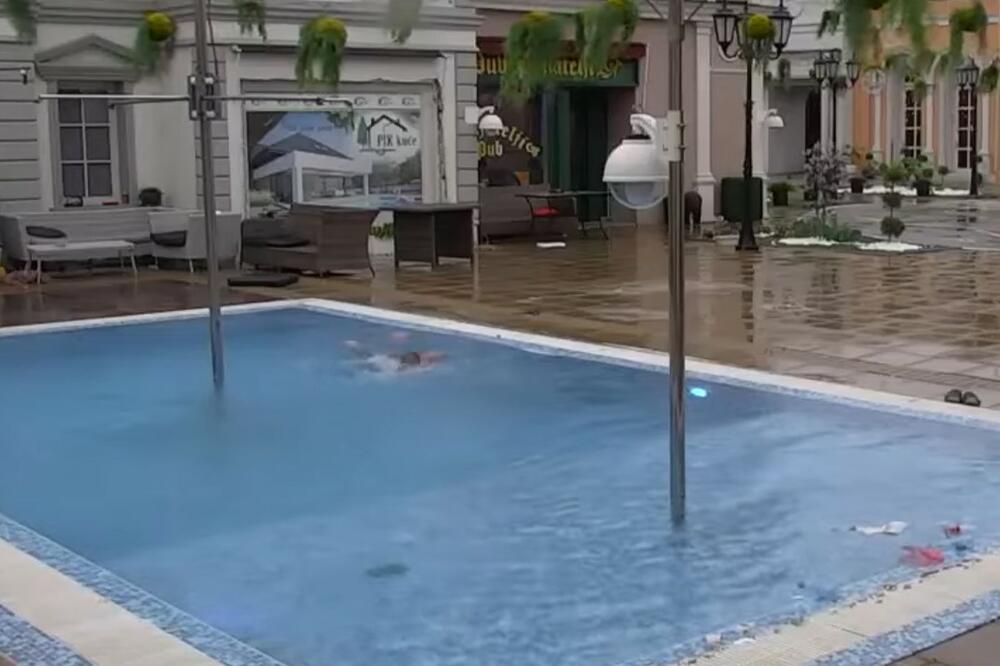 NJEMU NIJE HLADNO! Rijaliti učesnik skočio u bazen, obavio trening, ne smeta mu ni kiša! (VIDEO)