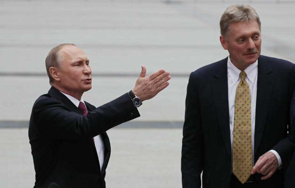 Vladimir Putin i Dmitrij Peskov