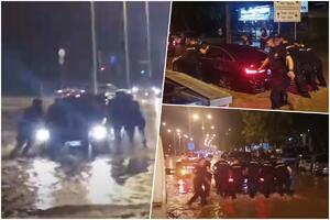 POLICAJCI IZNOSE LJUDE IZ VODE! Objavljen dramatičan snimak spasavanja nakon SNAŽNOG NEVREMENA u Beogradu (FOTO/VIDEO)