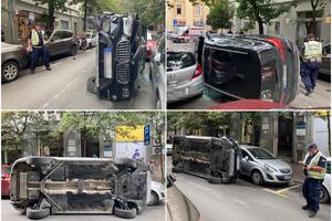 ŠTA SE OVDE DESILO: BMW se prevrnuo posle sudara sa parkiranim automobilom na Dorćolu! (FOTO / VIDEO)