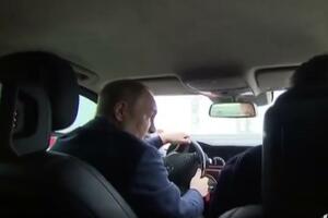 PUTIN POSETIO KRIMSKI MOST: Lično seo za volan i provozao se po njemu! Ruski predsednik izvršio inspekciju! VIDEO