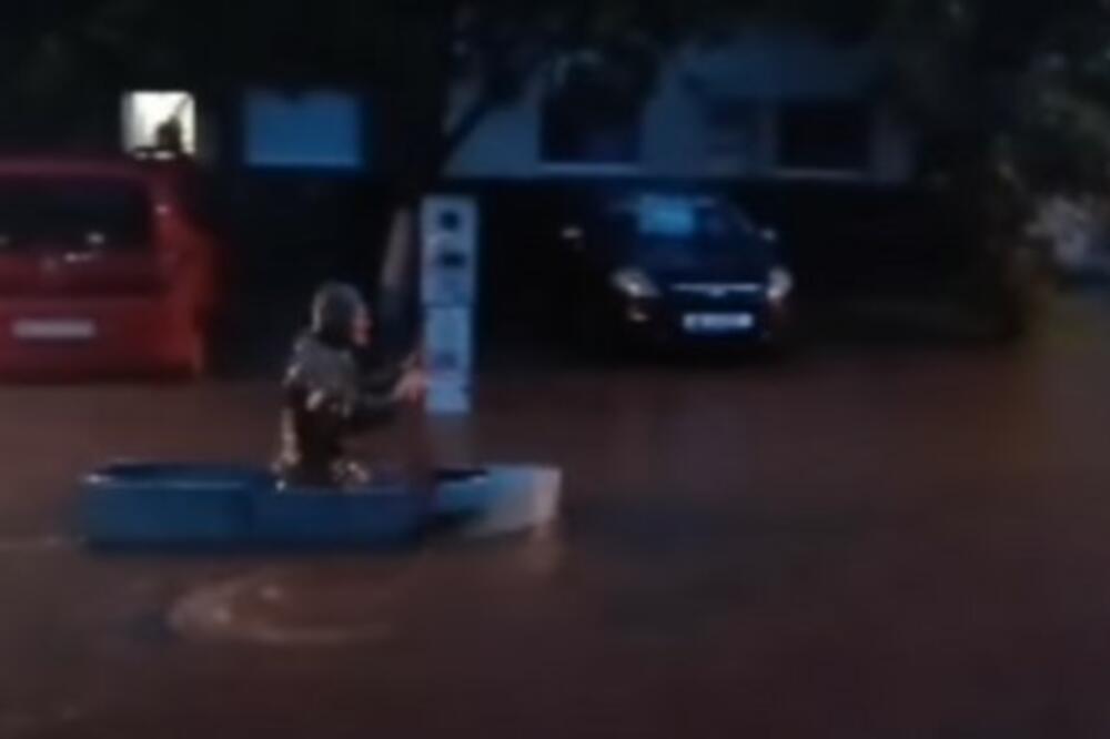 UŽIVO JUTRO POSLE POPLAVA U SRBIJI: Momak u vodi do grla, Novosađanin vesla u čamcu posred ulice! RHMZ upozorava Šapčane (VIDEO)