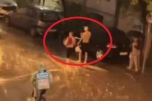 UDRI BRIGU NA VESELJE! Ceo Novi Sad potopljen, a oni za to NE MARE! Skinuli se do pojasa i... PA ŠOU! (VIDEO)