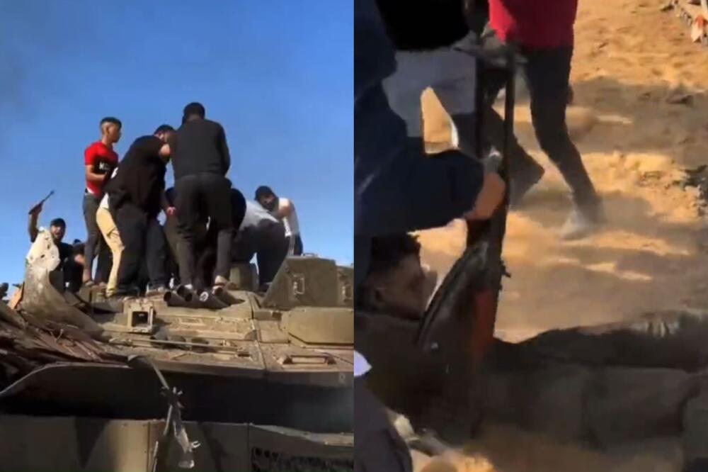 UZNEMIRUJUĆI SNIMAK IZ IZRAELA: Palestinci pogodili tenk, popeli se na sprženu olupinu, pa IZVUKLI ZA NOGE člana posade (VIDEO)