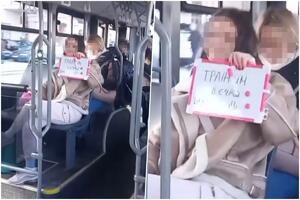 HIT SCENA U GRADSKOM AUTOBUSU: Mlada Beograđanka pokazala transparent i izazvala lavinu komentara, a dobila i OVAKVE ponude (FOTO)