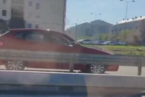 DA LI JE OVO MOGUĆE?! Žena se SMEJE i vozi KONTRASMEROM na auto-putu na Novom Beogradu (VIDEO)