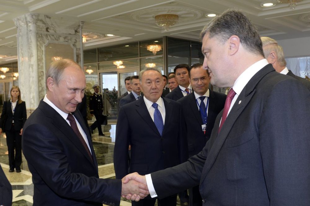 Zadovoljni: Vladimir Putin i Petar Porošenko, Foto Reuters